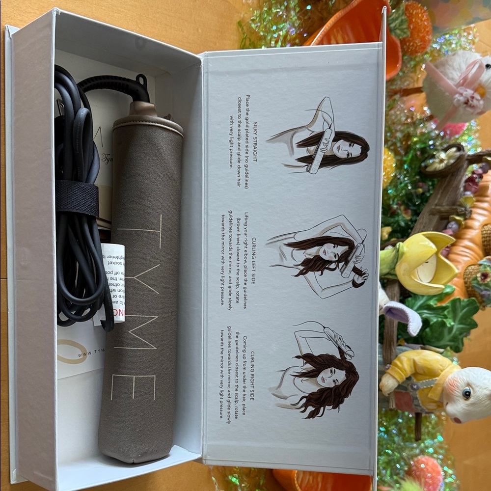 Brand new TYME curler/straightener in one